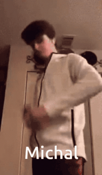 Man In White Jacket With Name Michal GIF