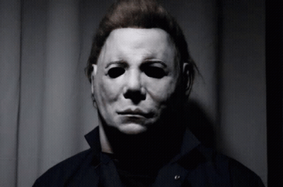 Man In White Mask And Black Shirt GIF