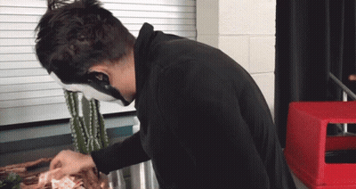 Man In White Mask Cleaning Cactus GIF