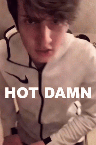 Man In White Nike Jacket Saying Hot Damn GIF