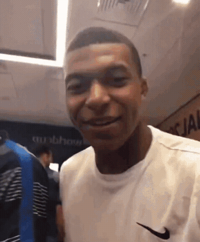 Man In White Nike Shirt Smiling GIF
