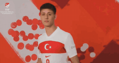 Man In White Nike Shirt With C And Star GIF