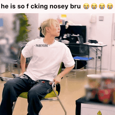 Man In White Pabeyork Shirt Sitting In Chair GIF