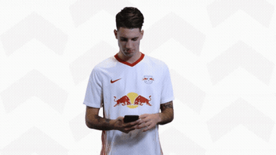 Man In White Red Bull Jersey Holding Cell Phone GIF