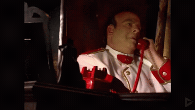 Man In White Red Uniform Talking On Red Phone 19 GIF