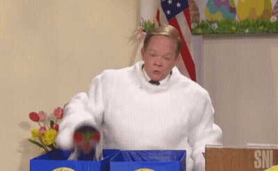 Man In White Robe At SNL Podium GIF