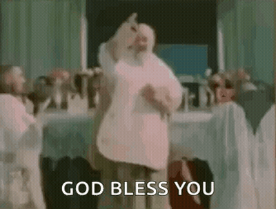 Man In White Robe Dancing Says God Bless You GIF