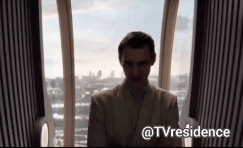 Man In White Robe In Front Of Window With @Tvresidence GIF