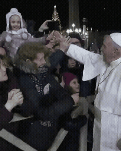 Man In White Robe Reaching To Crowd GIF