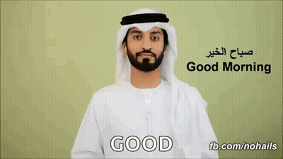 Man In White Robe Saying Good Morning In Arabic And English GIF