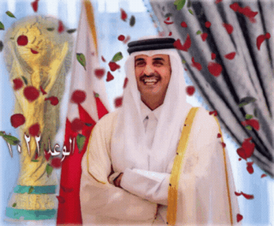 Man In White Robe Smiling At Trophy 2012 GIF