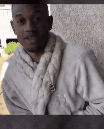 Man In White Robe With Letter H GIF