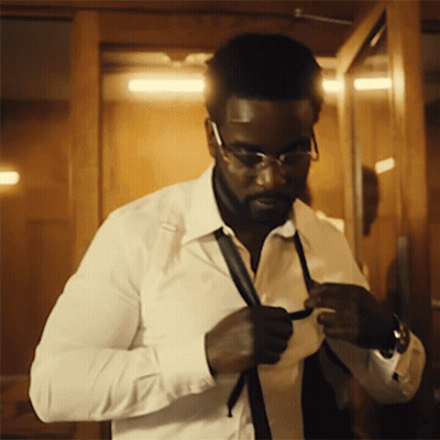 Man In White Shirt Adjusting Black Tie GIF