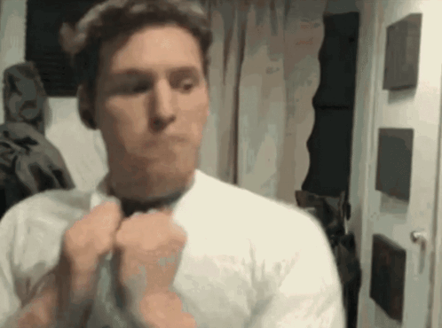Man In White Shirt Adjusting Tie GIF