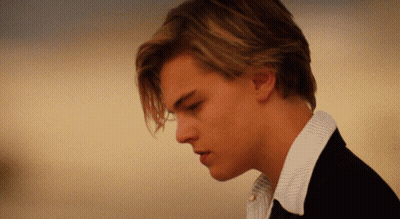 Man In White Shirt And Black Jacket Close Up GIF