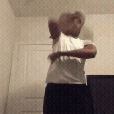 Man In White Shirt And Black Pants GIF