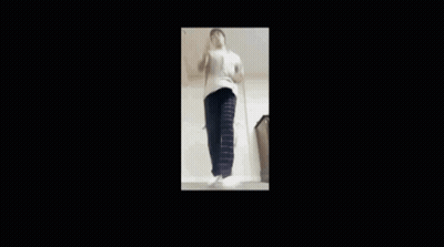 Man In White Shirt And Black Pants Dancing GIF