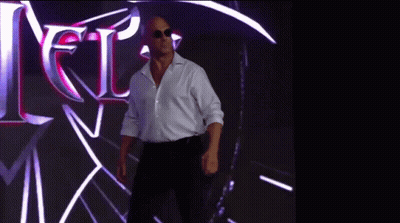 Man In White Shirt And Black Pants In Front Of Jets Sign GIF