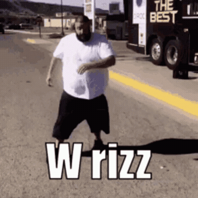 Man In White Shirt And Black Shorts Walking Past W Rizz GIF