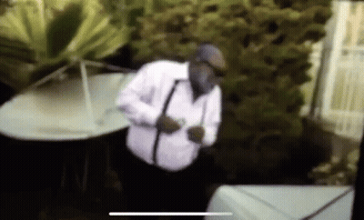 Man In White Shirt And Black Suspenders At Piano GIF
