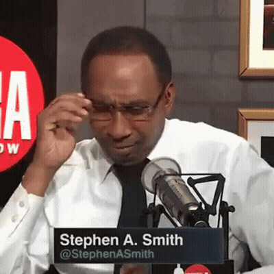 Man In White Shirt And Black Tie At Microphone With Stephen A. Sign GIF