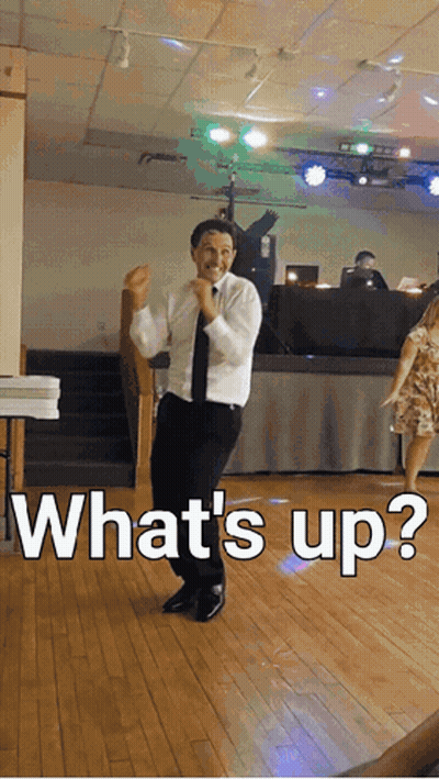 Man In White Shirt And Black Tie Dancing What's Up GIF