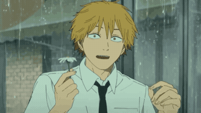 Man In White Shirt And Black Tie Holding Flower GIF