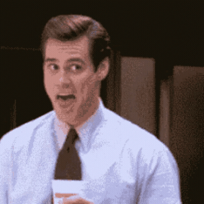 Man In White Shirt And Black Tie Holding Paper GIF
