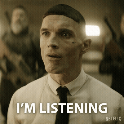 Man In White Shirt And Black Tie Says Im Listening Netflix GIF