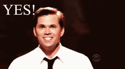 Man In White Shirt And Black Tie Smiling Funny Face GIF