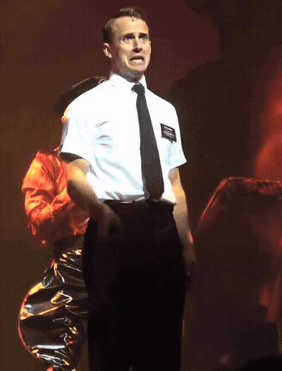 Man in White Shirt and Black Tie With Joseph Smith Patch
