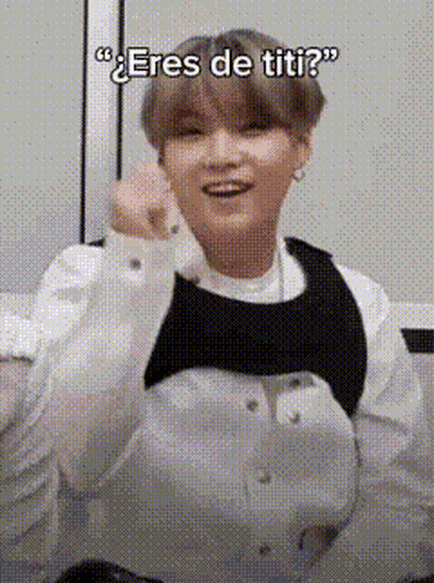 Man In White Shirt And Black Vest Making Heart GIF