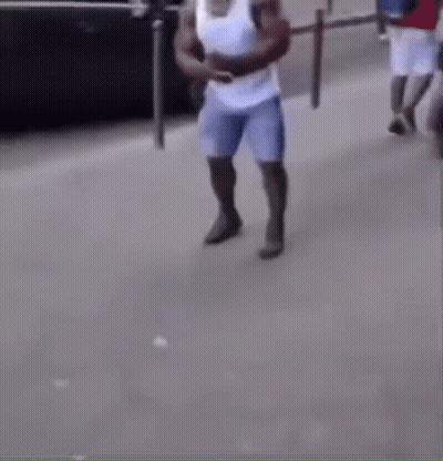 Man In White Shirt And Blue Shorts Crawling GIF