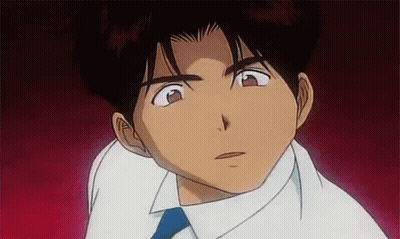 Man In White Shirt And Blue Tie Looking At Camera GIF