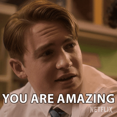 Man In White Shirt And Blue Tie Saying You Are Amazing GIF