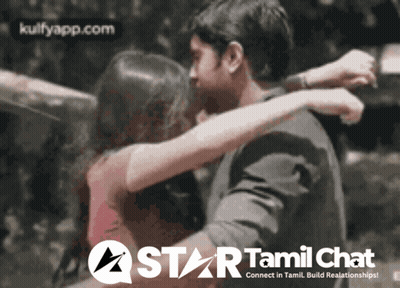 Man In White Shirt And Brown Pants Dancing With Woman In Orange Dress GIF