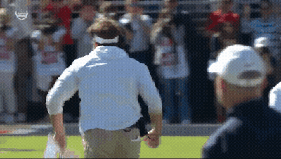 Man In White Shirt And Hat Running On Field GIF