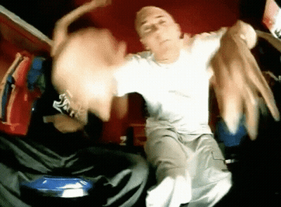 Man In White Shirt And Khaki Pants Dancing GIF