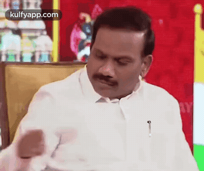 Man In White Shirt And Mustache Making Funny Face GIF