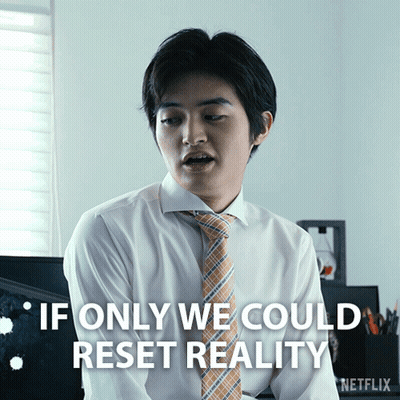 Man In White Shirt And Orange Tie Says If Only We Could Reset Reality GIF