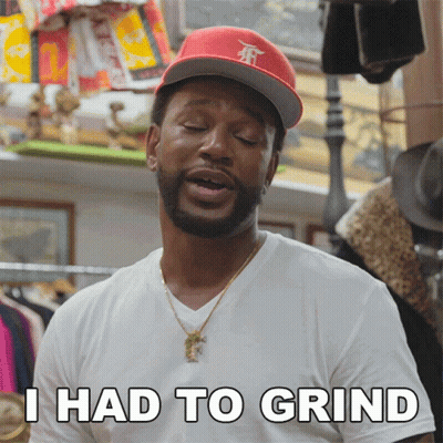 Man in White Shirt and Red Hat Says I Had to Grind