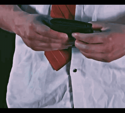 Man In White Shirt And Red Tie Holding Black Wallet GIF