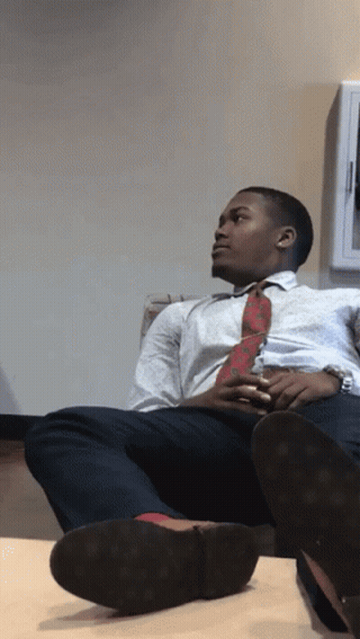 Man In White Shirt And Red Tie On Couch GIF