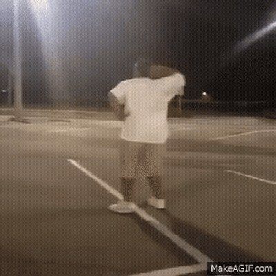 Man In White Shirt And Shorts Basketball Court Night GIF