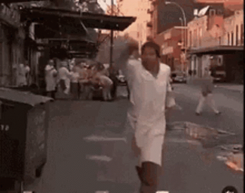 Man In White Shirt And Shorts Running GIF