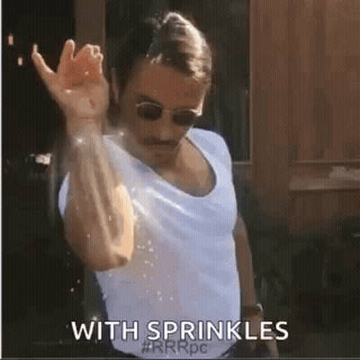 Man In White Shirt And Sunglasses Raising Hand GIF