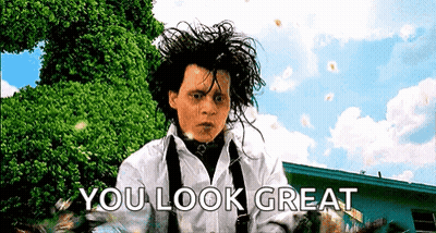 Man In White Shirt And Suspenders Saying You Look Great GIF