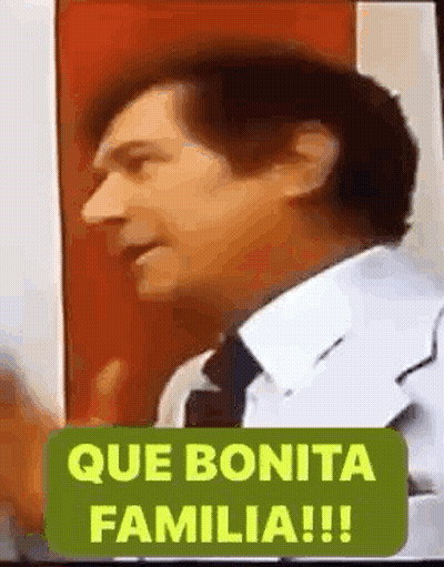 Man In White Shirt And Tie At Red Door GIF