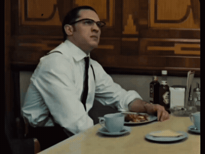 Man In White Shirt And Tie At Table With Plate Of Food GIF