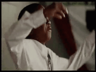 Man In White Shirt And Tie Covering Eyes GIF